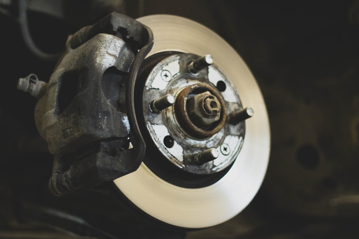 A brake rotor and caliper during a brake job
